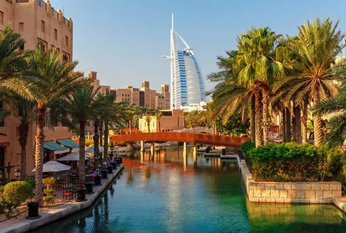 Dubai — the Burj Khalifa piercing the haze above Dubai's skyline